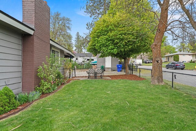 view of yard with fence