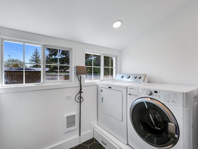610 Ross St, Davenport, WA 99122 - laundry room featuring dark tile patterned floors, visible vents, laundry area, and washing machine and clothes dryer