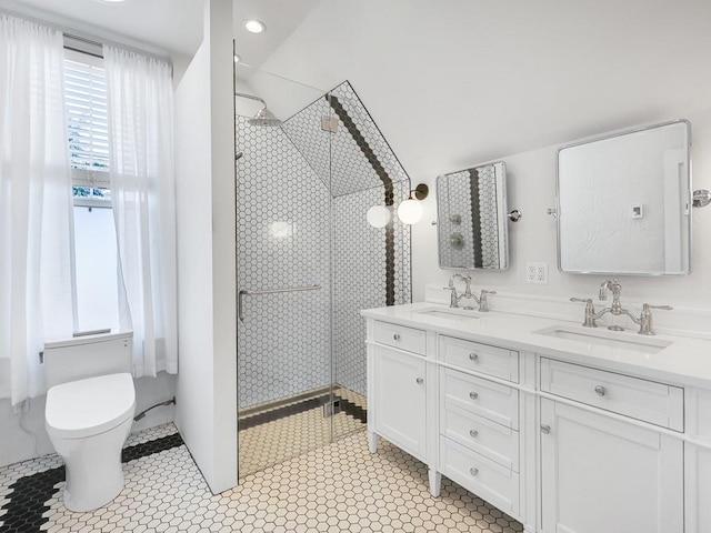610 Ross St, Davenport, WA 99122 - bathroom featuring double vanity, toilet, tiled shower, and a sink