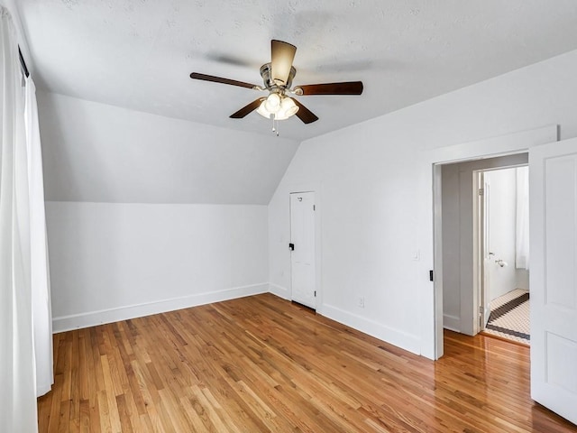 610 Ross St, Davenport, WA 99122 - additional living space with ceiling fan, vaulted ceiling, baseboards, and light wood finished floors
