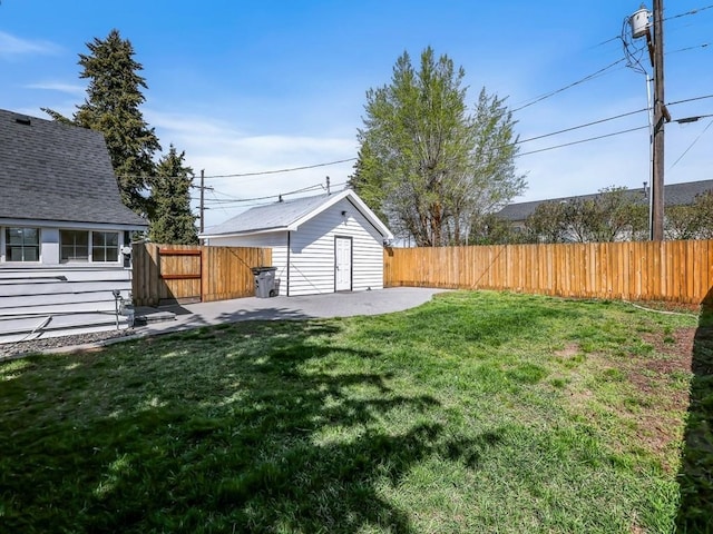 610 Ross St, Davenport, WA 99122 - view of yard with a fenced backyard, an outdoor structure, and a patio area
