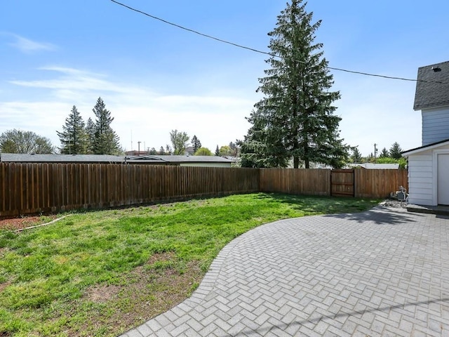 610 Ross St, Davenport, WA 99122 - view of yard featuring a patio and a fenced backyard