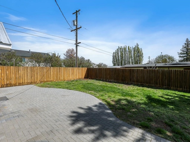 610 Ross St, Davenport, WA 99122 - view of yard featuring a fenced backyard and a patio