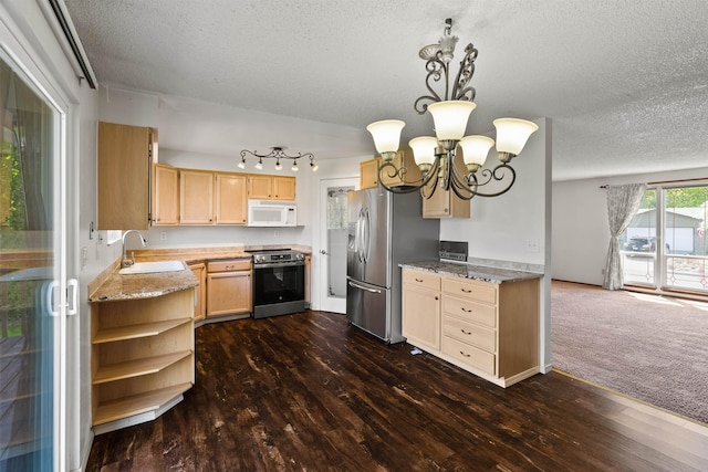 1317 S Woodlawn Rd, Spokane Valley, WA 99216 - kitchen with light brown cabinets, stainless steel appliances, a textured ceiling, and a chandelier