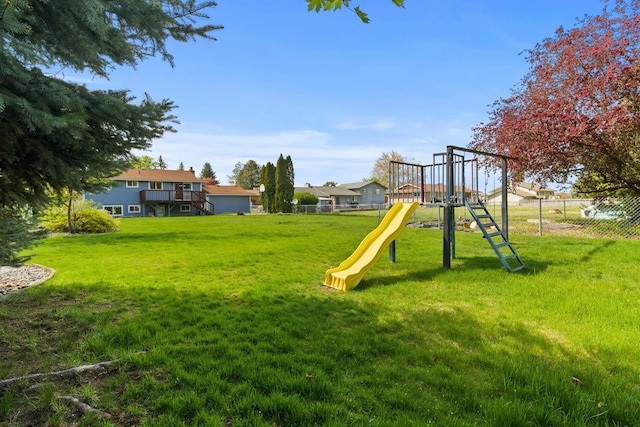 1317 S Woodlawn Rd, Spokane Valley, WA 99216 - view of playground featuring a yard and fence
