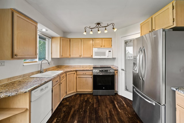1317 S Woodlawn Rd, Spokane Valley, WA 99216 - kitchen with a sink, light brown cabinetry, and stainless steel appliances