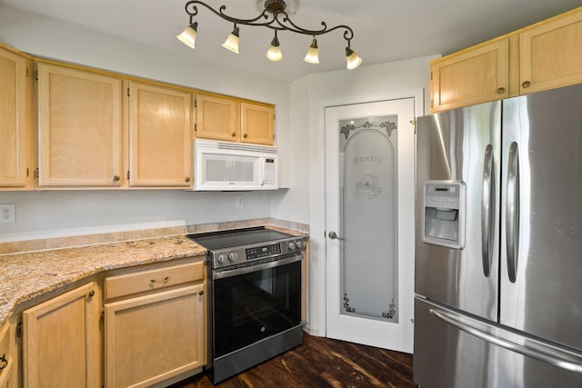 1317 S Woodlawn Rd, Spokane Valley, WA 99216 - kitchen with light brown cabinets, stainless steel appliances, and dark wood-type flooring