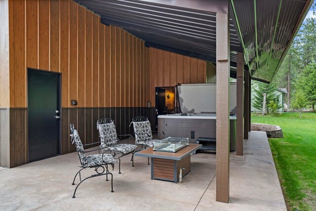 view of patio with a fire pit