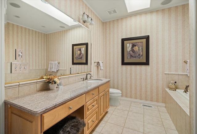 1909 E Pinecrest Rd, Spokane, WA 99203 - bathroom with tile patterned flooring, vanity, ornamental molding, a bath, and toilet