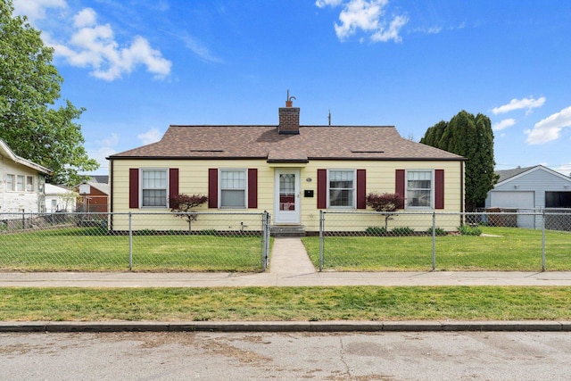 view of front facade featuring a fenced front yard, a chimney, and a front lawn