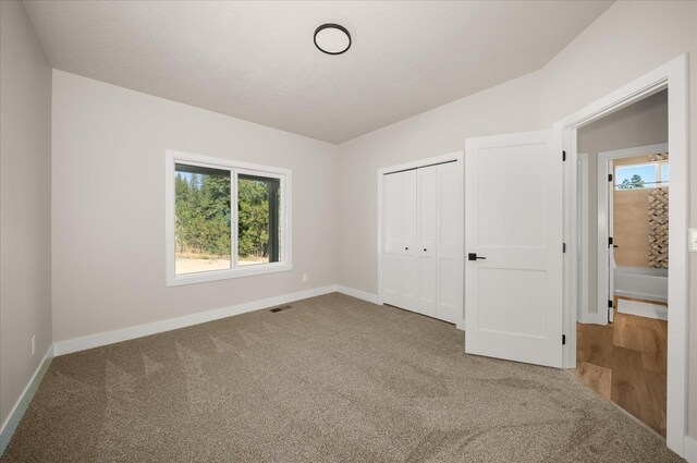 12822 S Sherman Rd, Spokane, WA 99224 - unfurnished bedroom with carpet floors and baseboards