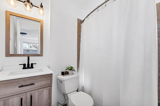 5804 N Regal St, Spokane, WA 99208 - full bath featuring toilet, curtained shower, and vanity