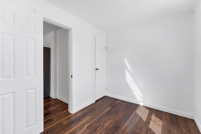 5804 N Regal St, Spokane, WA 99208 - spare room featuring baseboards, ornamental molding, and dark wood finished floors