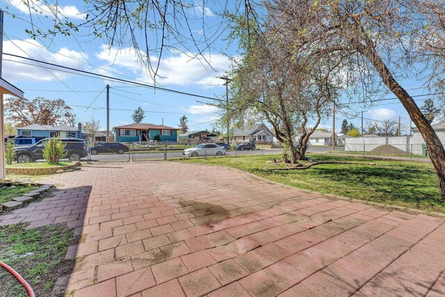 5804 N Regal St, Spokane, WA 99208 - view of patio with fence and a residential view