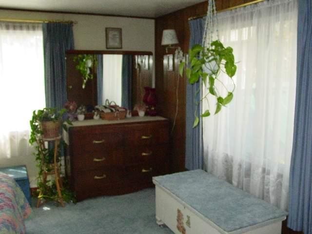 bedroom with light carpet