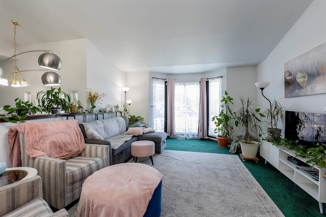 living area featuring carpet floors and a notable chandelier