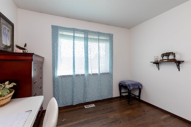 interior space featuring wood finished floors and visible vents