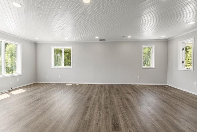 572 Smiley Ln, Newport, WA 99156 - spare room featuring visible vents, crown molding, wood finished floors, and a wealth of natural light