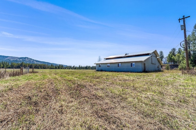 572 Smiley Ln, Newport, WA 99156 - view of yard featuring an outdoor structure, a pole building, and a rural view