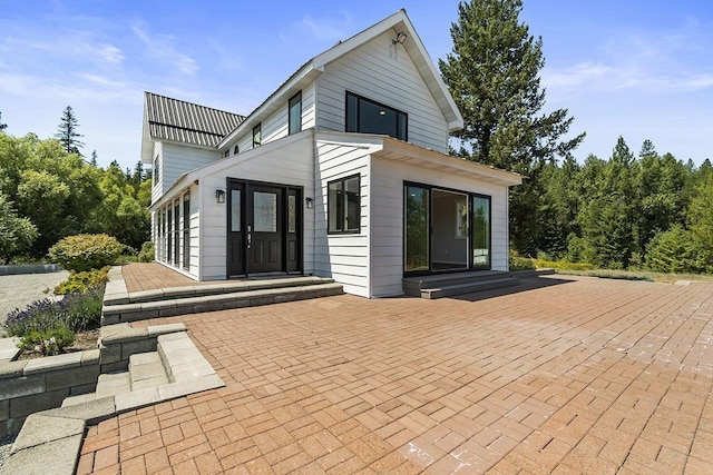 572 Smiley Ln, Newport, WA 99156 - back of house featuring metal roof