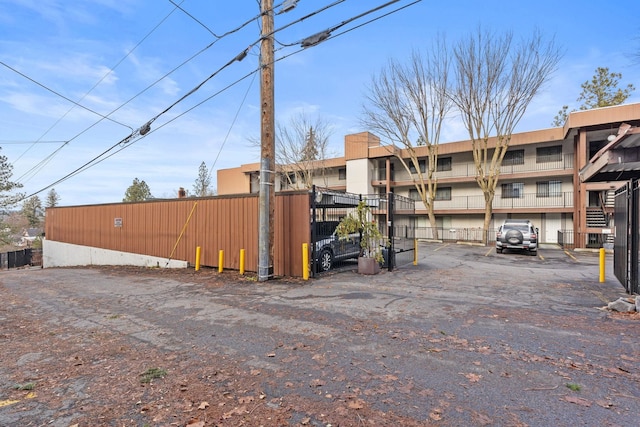 1111 W 6th Ave # 205, Spokane, WA 99204 - view of building exterior featuring uncovered parking