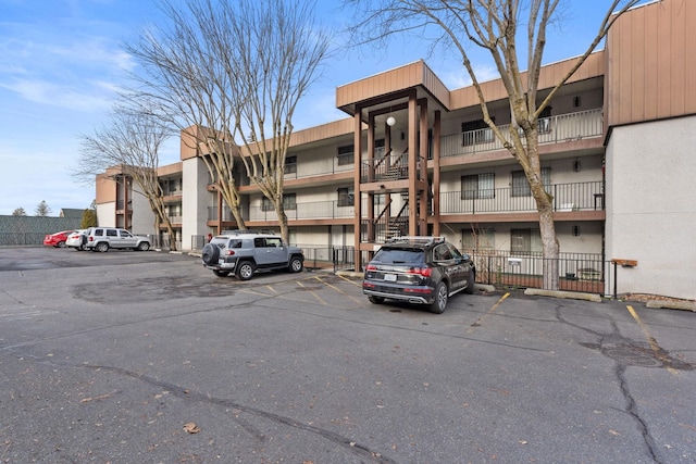 1111 W 6th Ave # 205, Spokane, WA 99204 - view of apartment building / complex with uncovered parking
