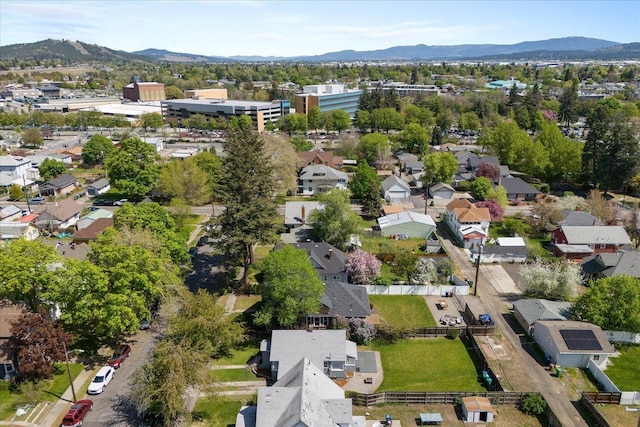birds eye view of property featuring a mountain view and a residential view