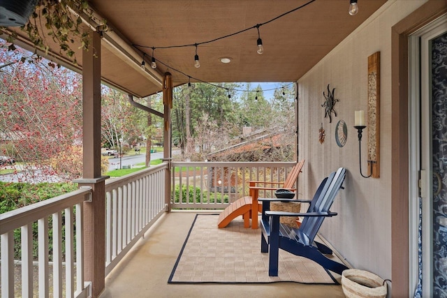 balcony featuring a porch
