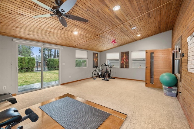 workout area featuring carpet floors, a ceiling fan, wood ceiling, and baseboards