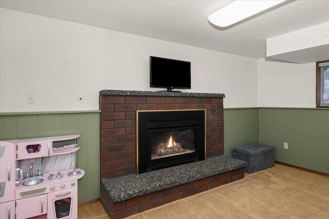 room details with carpet floors and a brick fireplace