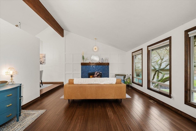 living room with dark wood-type flooring, lofted ceiling with beams, baseboards, and visible vents