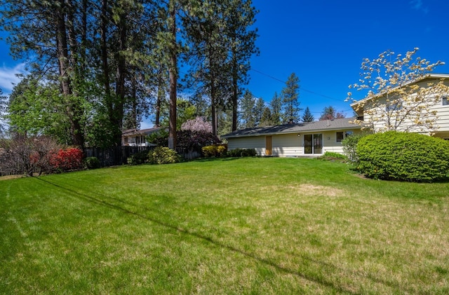 view of yard with fence