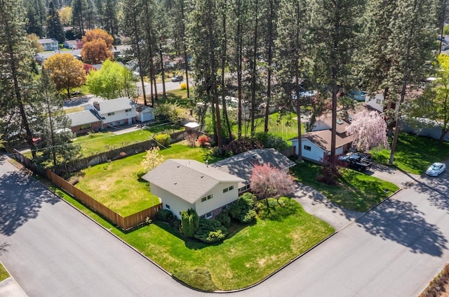 birds eye view of property with a residential view