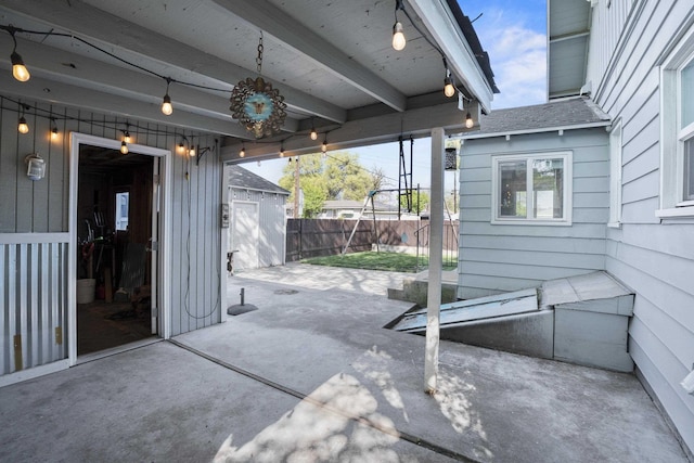 view of patio / terrace with fence