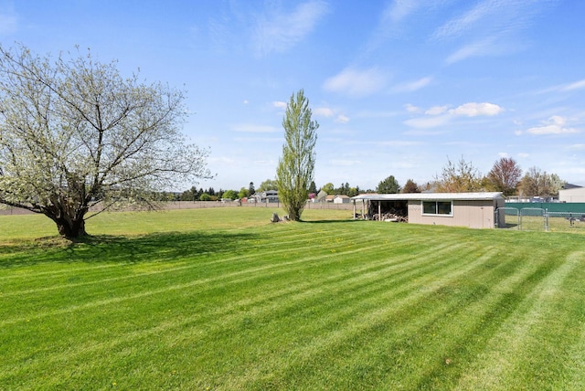 view of yard with fence