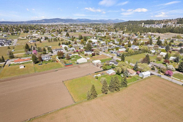 birds eye view of property with a residential view and a mountain view
