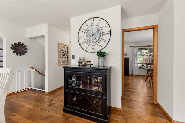 16503 N Mockingbird Ln, Nine Mile Falls, WA 99026 - hall featuring wood-type flooring, baseboards, and an upstairs landing