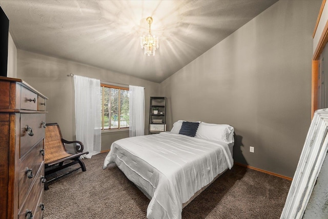 16503 N Mockingbird Ln, Nine Mile Falls, WA 99026 - carpeted bedroom with baseboards, lofted ceiling, and a notable chandelier