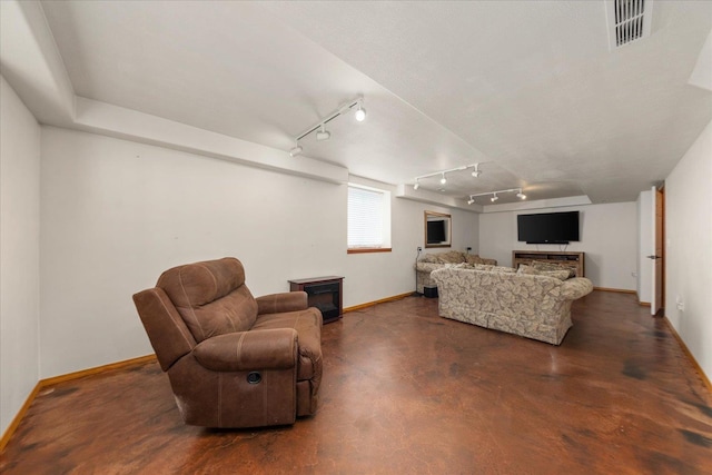 16503 N Mockingbird Ln, Nine Mile Falls, WA 99026 - living room with baseboards, a fireplace, concrete floors, and visible vents