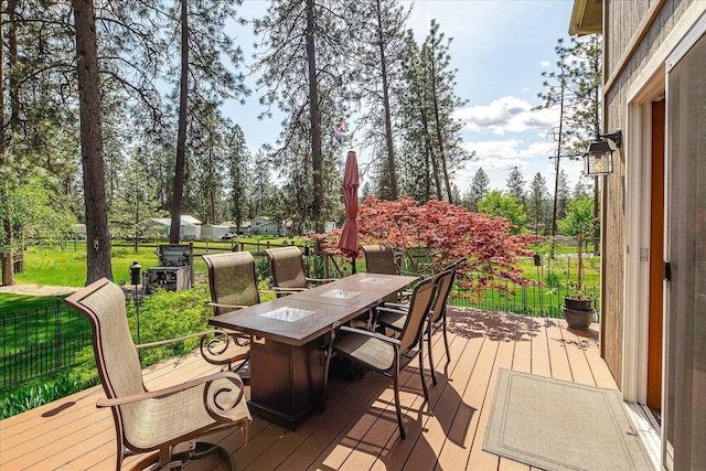 16503 N Mockingbird Ln, Nine Mile Falls, WA 99026 - wooden terrace with a yard and outdoor dining space