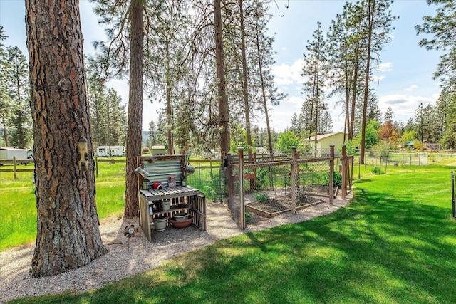 16503 N Mockingbird Ln, Nine Mile Falls, WA 99026 - view of yard featuring fence and a vegetable garden