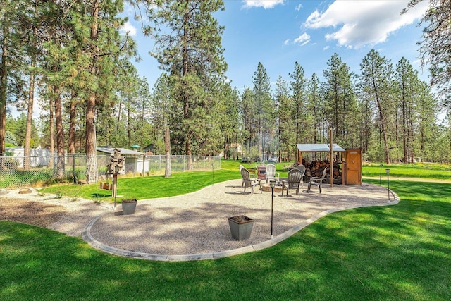 16503 N Mockingbird Ln, Nine Mile Falls, WA 99026 - exterior space featuring a patio and fence