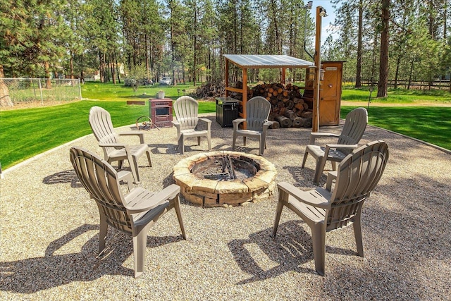16503 N Mockingbird Ln, Nine Mile Falls, WA 99026 - view of patio with a fire pit and fence