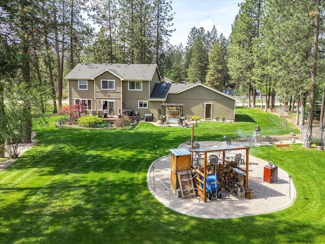 16503 N Mockingbird Ln, Nine Mile Falls, WA 99026 - rear view of house with a yard
