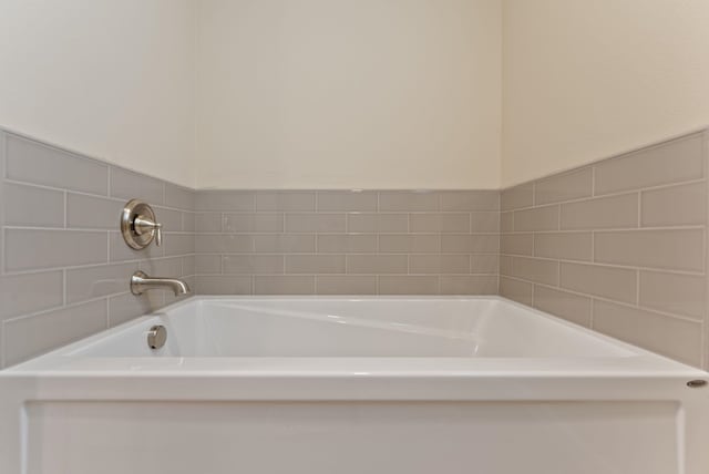 full bath featuring a bath