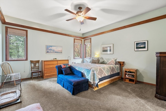 bedroom with carpet flooring, baseboards, and ceiling fan