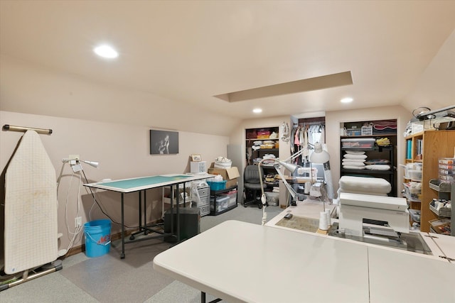 office space with recessed lighting, carpet, and vaulted ceiling
