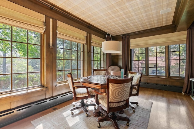 615 E 16th Ave, Spokane, WA 99203 - sunroom featuring french doors, baseboard heating, and wood finished floors