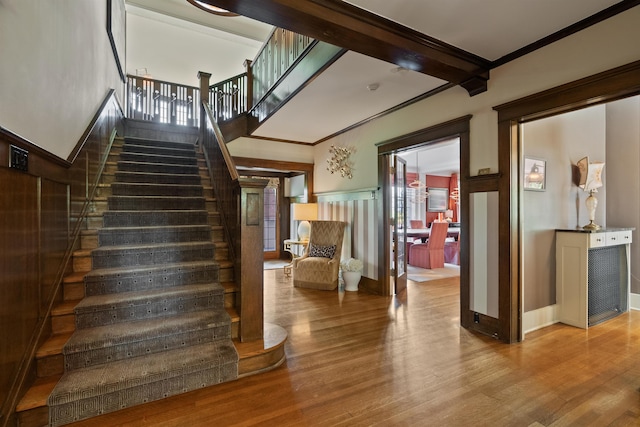 615 E 16th Ave, Spokane, WA 99203 - stairway with baseboards, ornamental molding, and wood finished floors