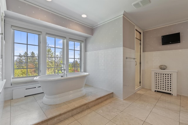 615 E 16th Ave, Spokane, WA 99203 - bathroom featuring tile walls, plenty of natural light, visible vents, and tile patterned flooring